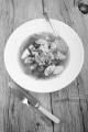 irish chicken stew in a white bowl