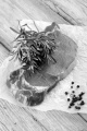 raw beef steak with pepper and salt on kitchen paper