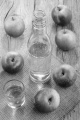 bottle and glass filled with hungarian palinka made from apple
