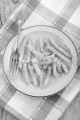 french fries with salt and fork on a plate