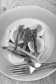 warm waffle with cooked egg, anchovis, parsley