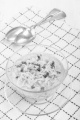 instant noodles in a glass bowl and spoon