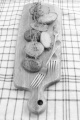 oven baked potato with thyme on wooden board