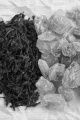 brown rock candy sugar and black tea on brown paper