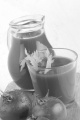 cold tomato juice with celery in a glass