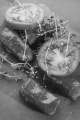 stuffed grape leaves, tomato and thyme on slate