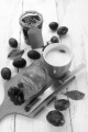 breakfast with croissant, plum jam and cafe au lait