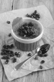 creme brulee with pomegranate seed and mint