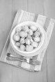 organic baby jacket potatoes chopped radish in a bowl