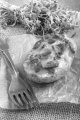 baked potato with melted cheese, chorizo and thyme