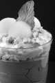 chocolate mousse with whipped cream, mocha meringue, honeydew melon and mint