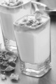 greek yogurt with honey and walnuts in a shot glass