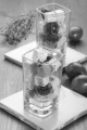 mediterranean salad, made with olive, spices and cubed goat cheese in a shot glass