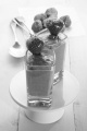 chocolate pudding dessert in a shot glass with strawberry