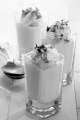 strawberry mousse with whipped cream and chocolate curls