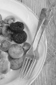 irish breakfast with black and white pudding, tomato, bacon and mushroom