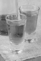 dark rum in a shot glass on jute