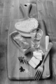 fat bacon with bread, vodka, pepper, coarse salt and rosemary on wooden board